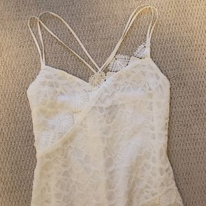 White Top Shop Lace Mini Dress with slanted hem, size 6